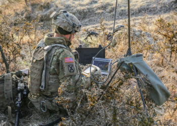 A U.S. Army Soldier assigned to the 2nd Cavalry Regiment prepares to control the AeroVironment RQ-11 Raven unmanned aerial vehicle, to scout out the opposing force during Dragoon Ready 21 at the Hohenfels Training Area, April 15, 2021. Daily training, conducted in realistic environments, under realistic circumstances, ensures our forces maintain the highest levels of proficiency and readiness for worldwide deployment. (U.S. Army photo by Spc. Zachary Bouvier)