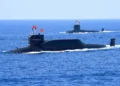 A nuclear-powered Type 094A Jin-class ballistic missile submarine of the Chinese People's Liberation Army Navy in waters during a military display in the South China Sea in April 2018. | REUTERS