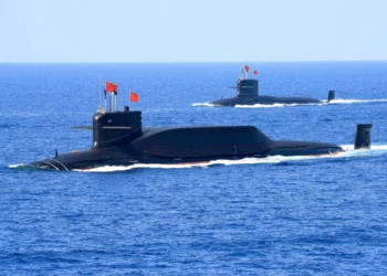 A nuclear-powered Type 094A Jin-class ballistic missile submarine of the Chinese People's Liberation Army Navy in waters during a military display in the South China Sea in April 2018. | REUTERS